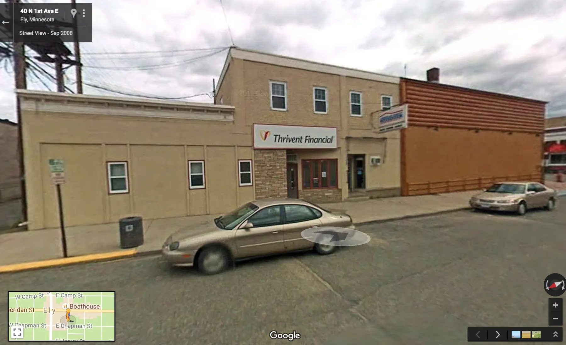 2008 street view of First Avenue with the log-sided building at the right