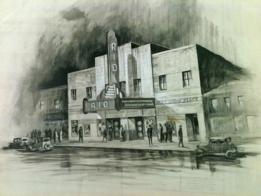 Charcoal drawing of the Rio Theatre on a busy street with vintage cars